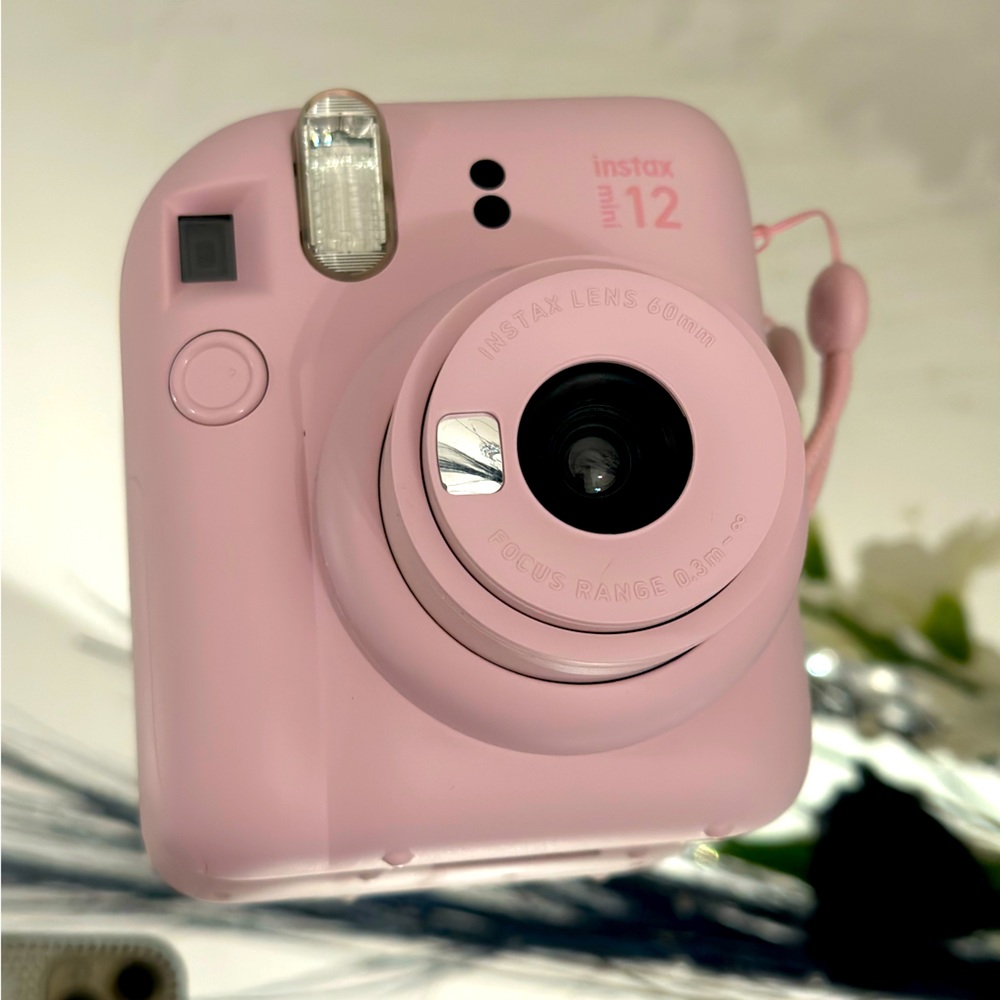 Baby pink fujifilm instax mini 12 film camera